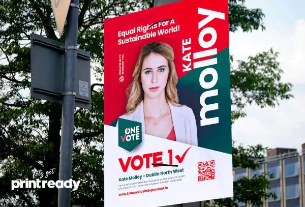 Printed election poster mounted on a pole