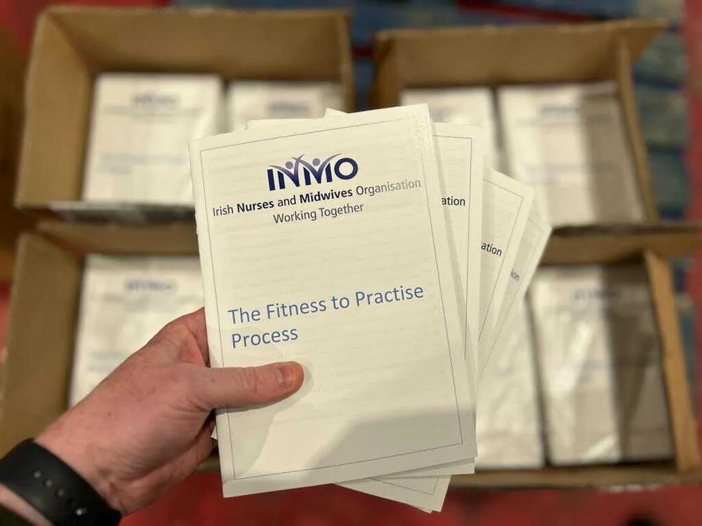 INMO booklets being checked before delivery