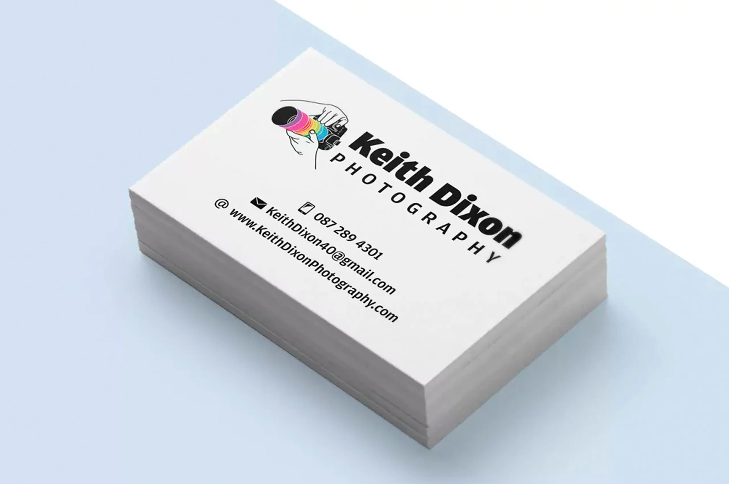 Stack of business cards printed by Print Ready for Keith Dixon Photography
