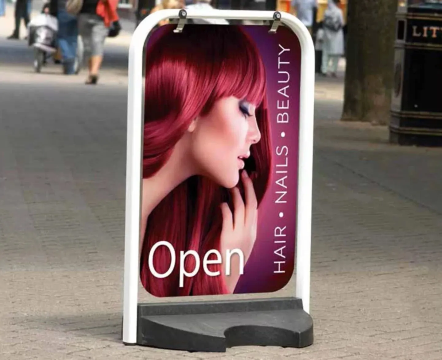 Pavement swing sign for a hair and beauty salon