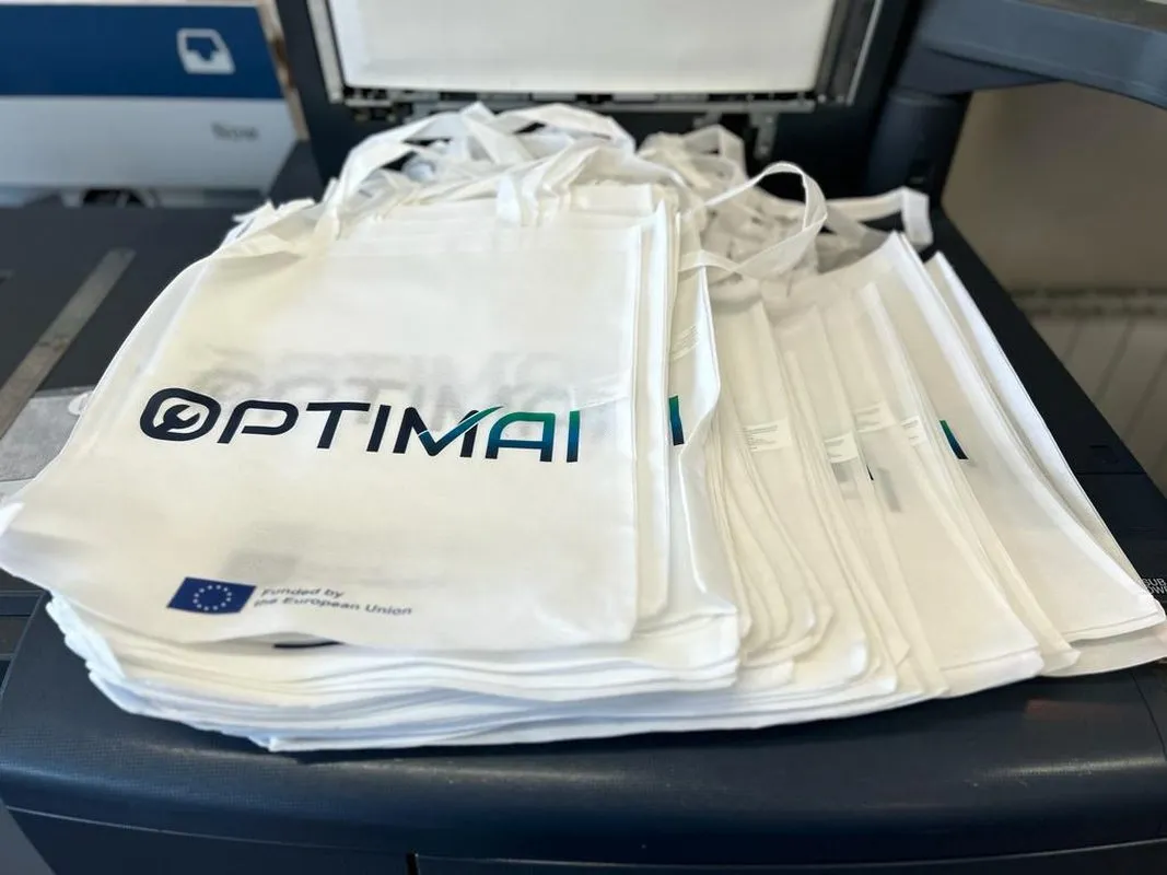 Stack of custom printed cotton tote bags for Optimal - Print Ready