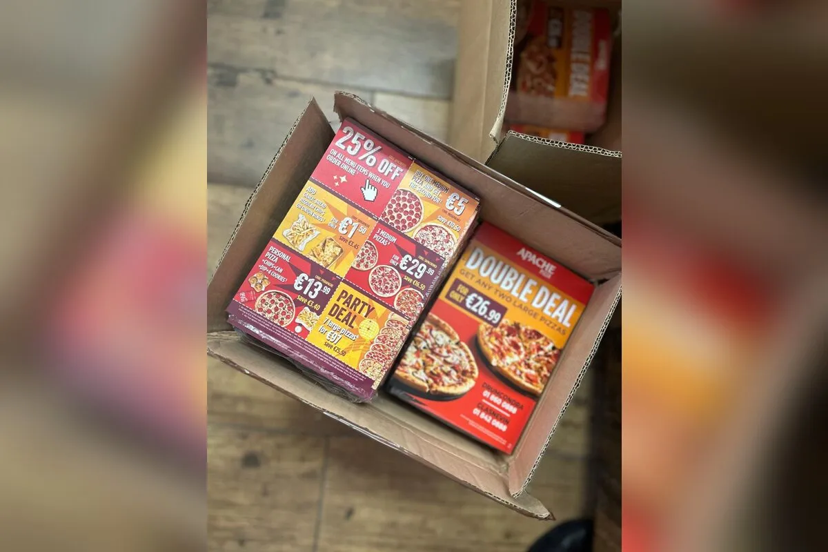 Box of printed Apache Pizza leaflets