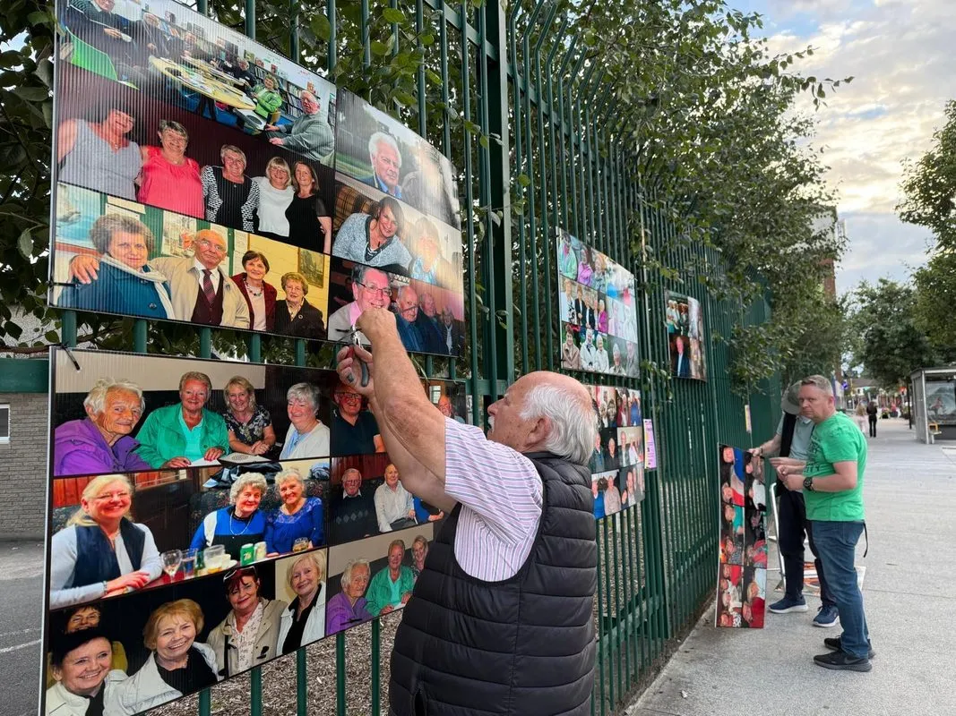 Corriboard prints of Faces of Finglas displayed on railings - Print Ready