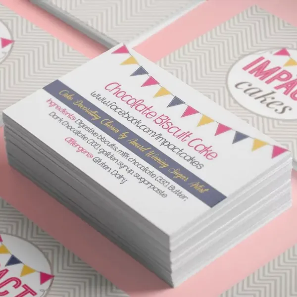 Colourful printed patisserie business cards showing creative brand design