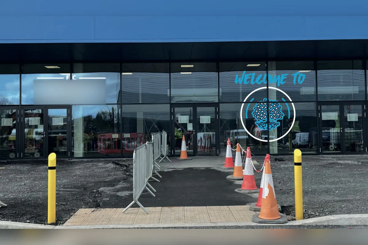 Fulfilment centre entrance with welcome window graphics