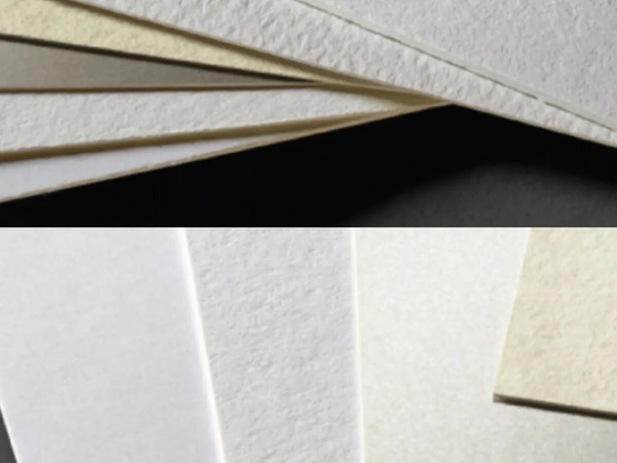 Close-up of layered paper textures in different weights and finishes