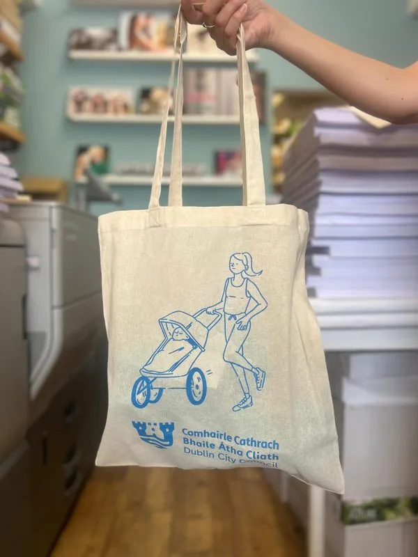 Cotton tote bag with a blue pram illustration for Dublin City Council active travel week - Print Ready