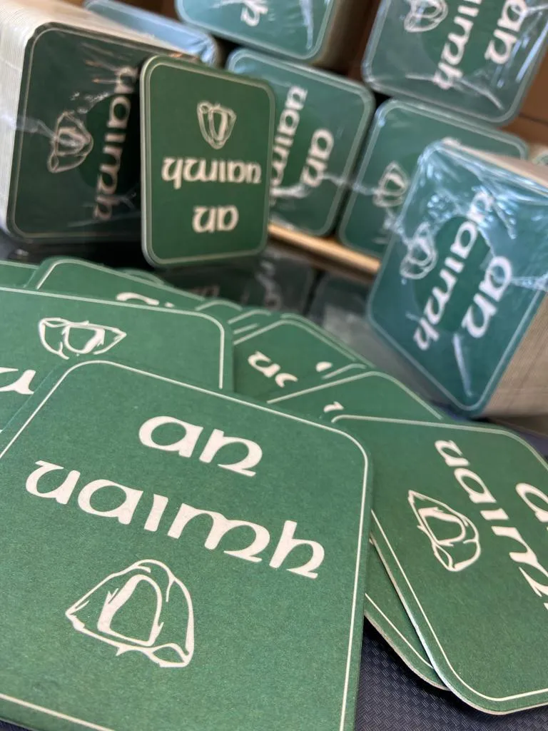 Green printed beer mats