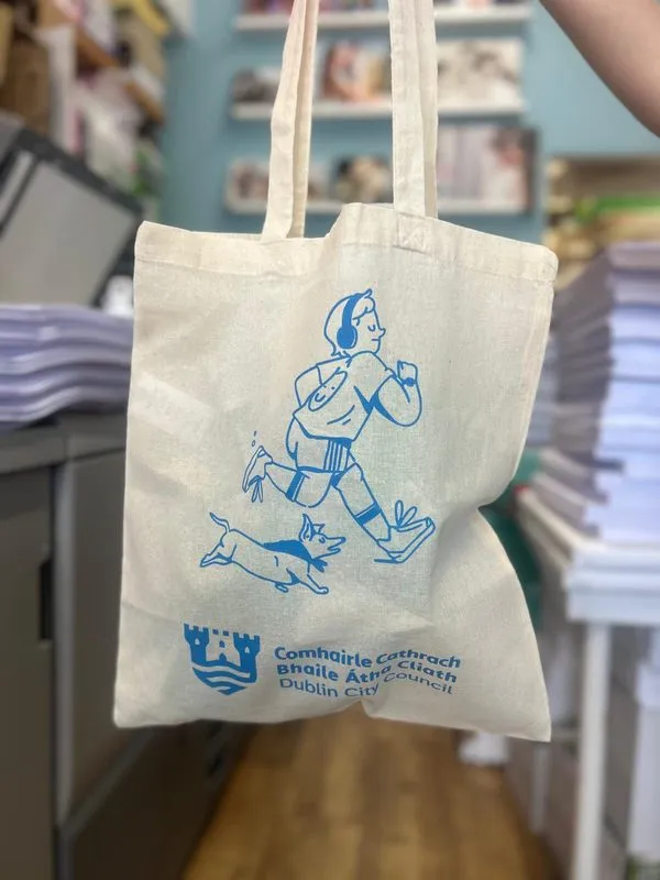 Cotton tote bag with a blue running illustration for Dublin City Council active travel week - Print Ready