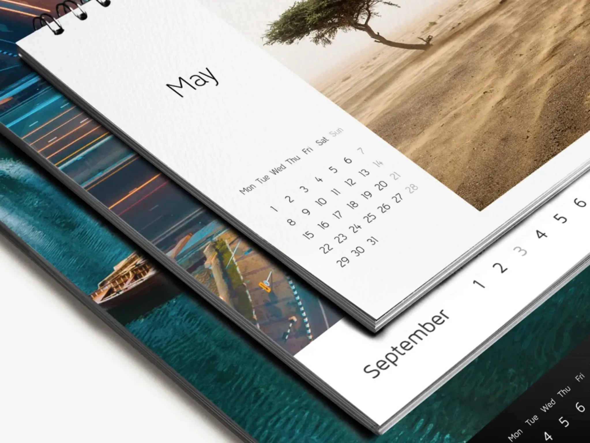 Printed desktop calendar showing monthly pages