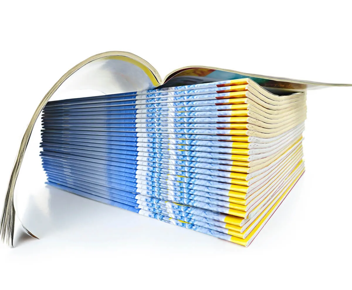 Stack of printed magazines and booklets