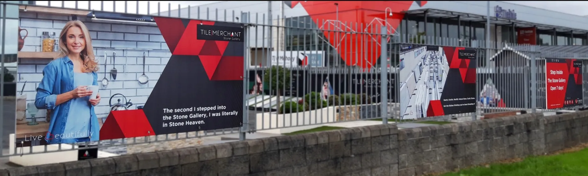 Printed corriboard fence banners for Tile Merchant, mounted on railings