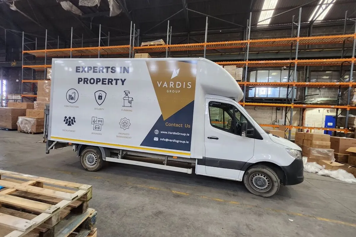 Vardis Group branded box truck in warehouse