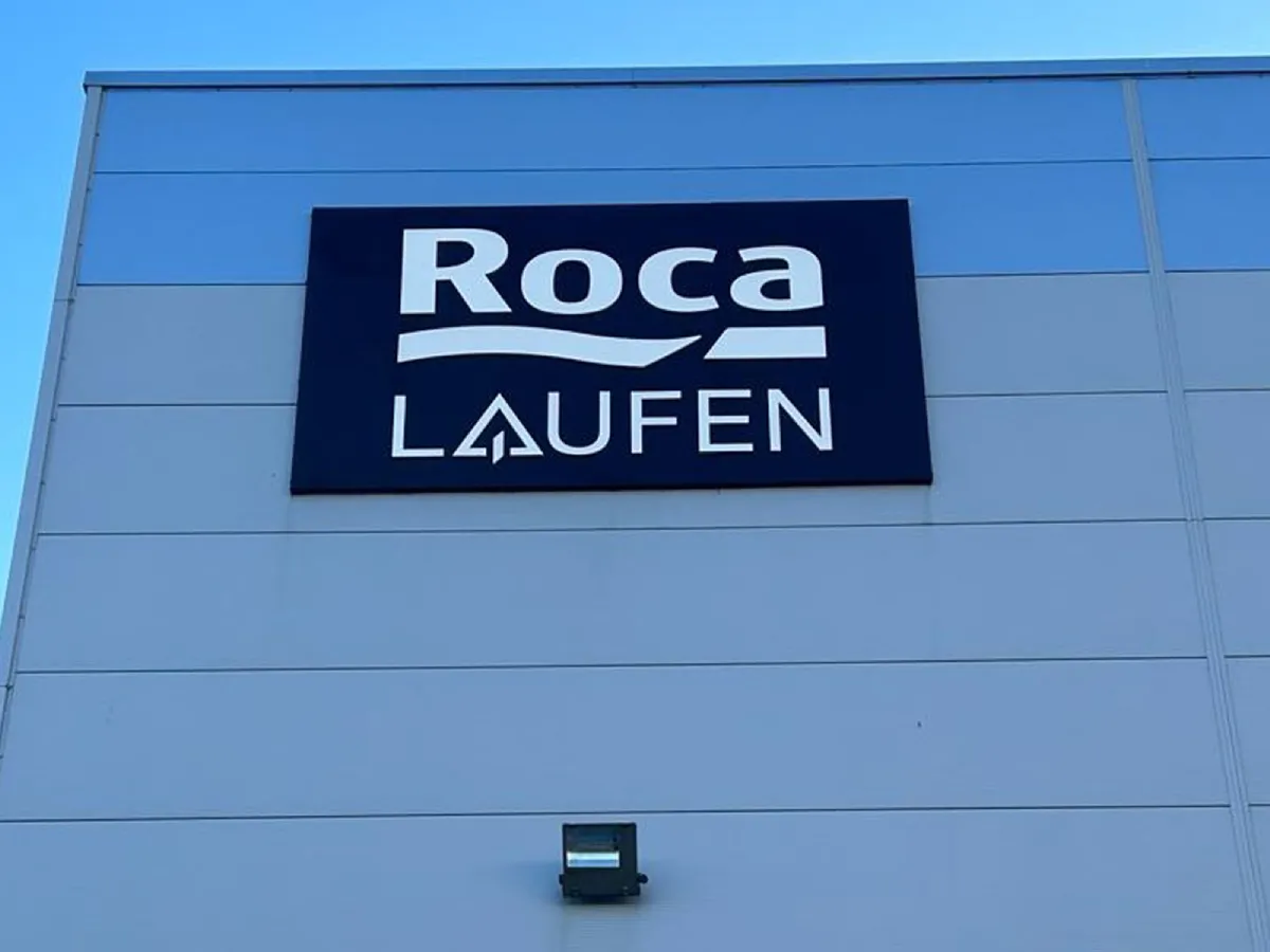 Roca Tiles exterior aluminium building sign with raised white lettering installed by Print Ready