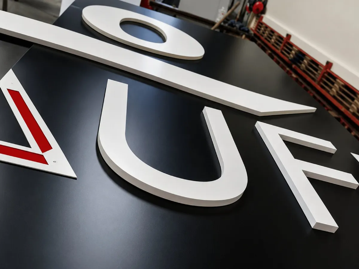 Roca Tiles exterior aluminium building sign with raised white lettering installed by Print Ready