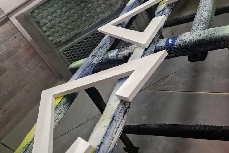 Raised white lettering for the Roca Tiles signs in the Print Ready spray shop