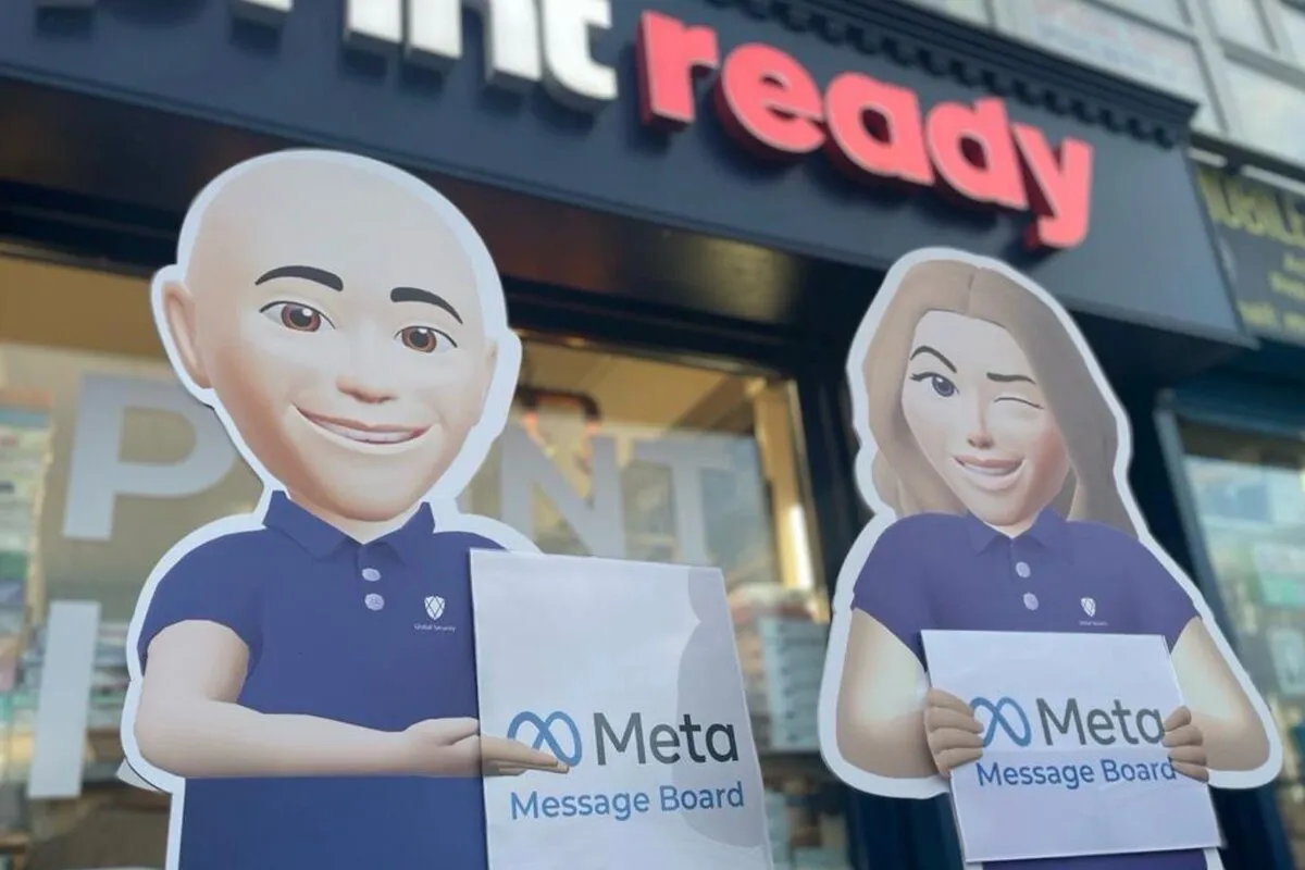 Meta life-size avatar cut-outs holding Meta Message Boards outside the Print Ready shop