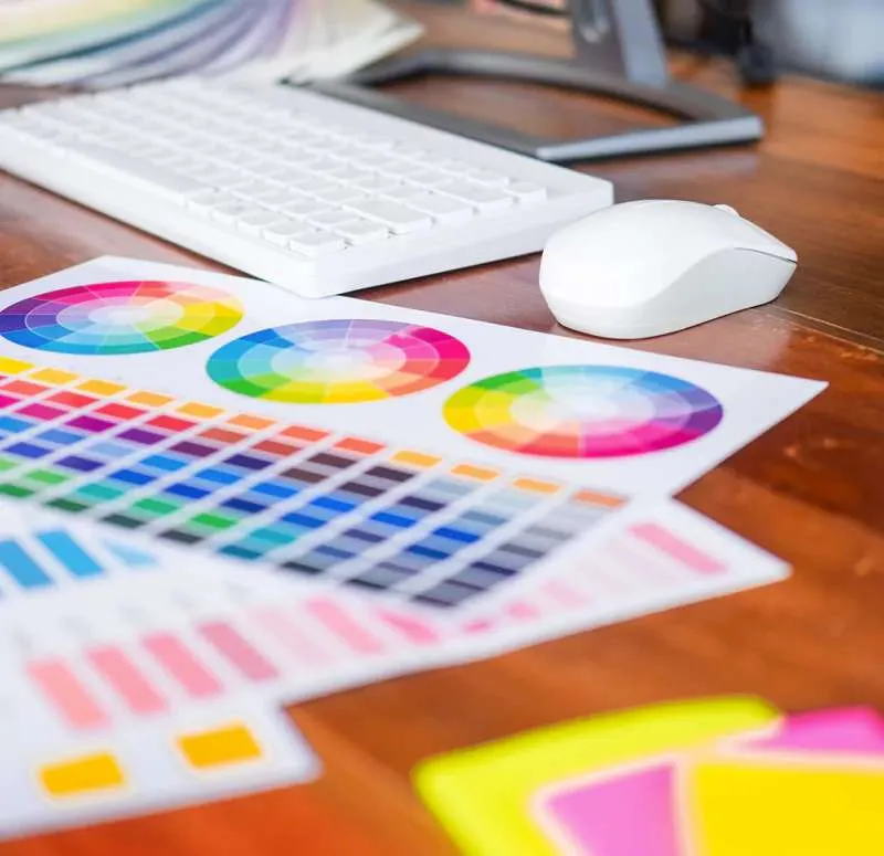 Color swatches and design materials on desk