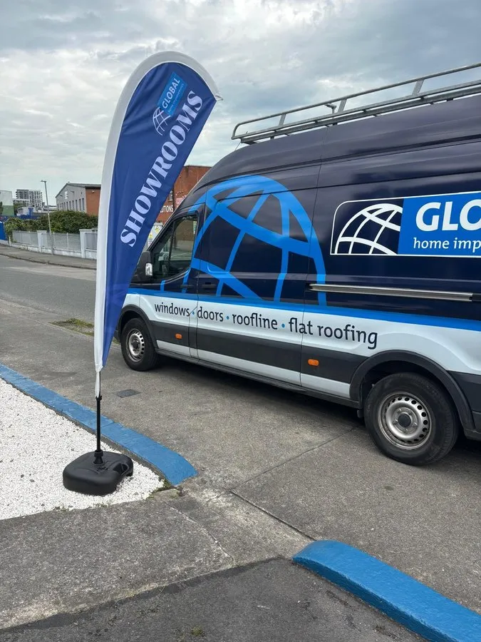 Global Home Improvements teardrop flag on a van - Print Ready