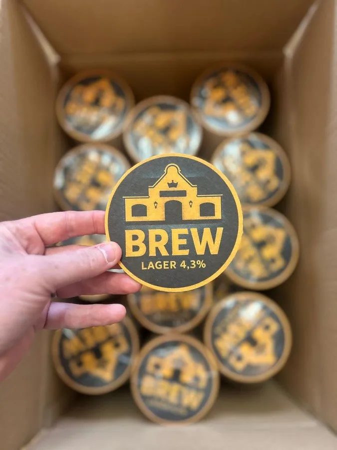 Printed beermats packed in a box, ready to ship