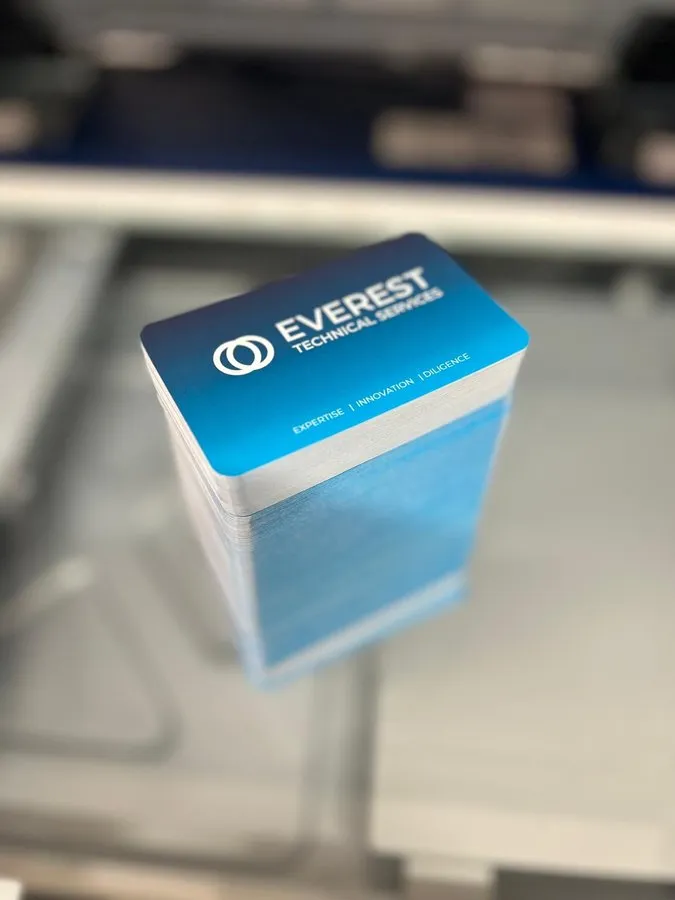 Round-cornered business cards in a stack
