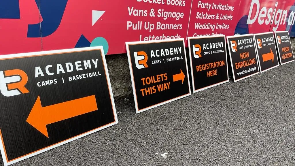 Directional corriboard signage for a sports camp - Print Ready