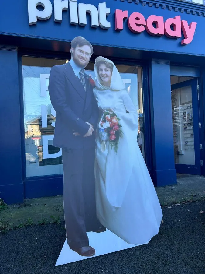 Wedding couple cutout outside our shop - Print Ready
