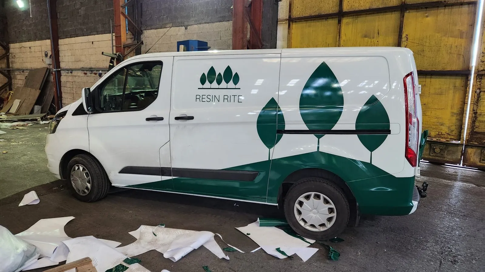 Resin Rite van with partial wrap being fitted