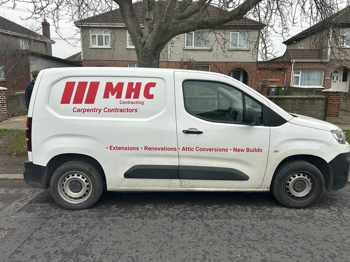 MHC Contracting van with printed decals
