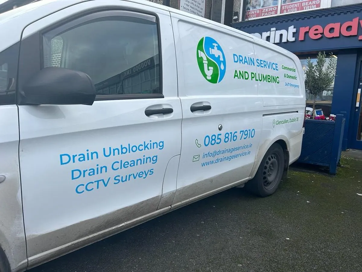 Drain Service and Plumbing van with printed decals