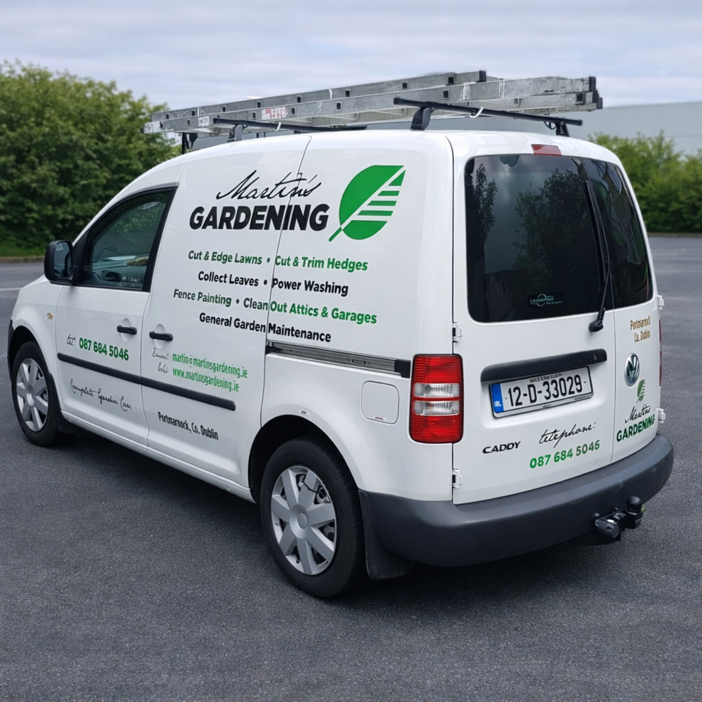 Large graphic being aligned on the van panel — MR CROQUETA wrap fitting step 1