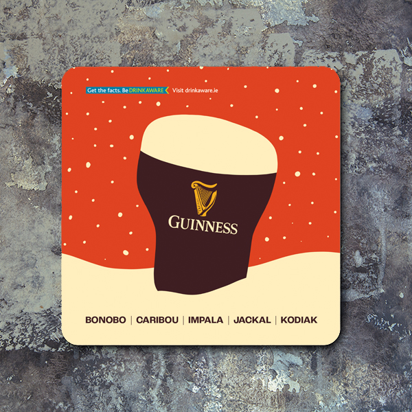Custom printed red Guinness Christmas beermat