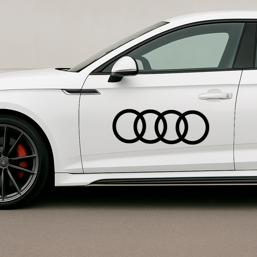Audi logo montert på hvit bil